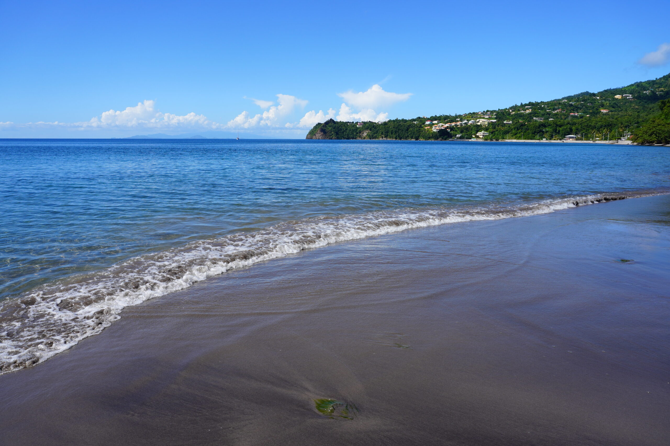 A view of Douglas Beach Bay looking towards Cabrits National Park in Dominica